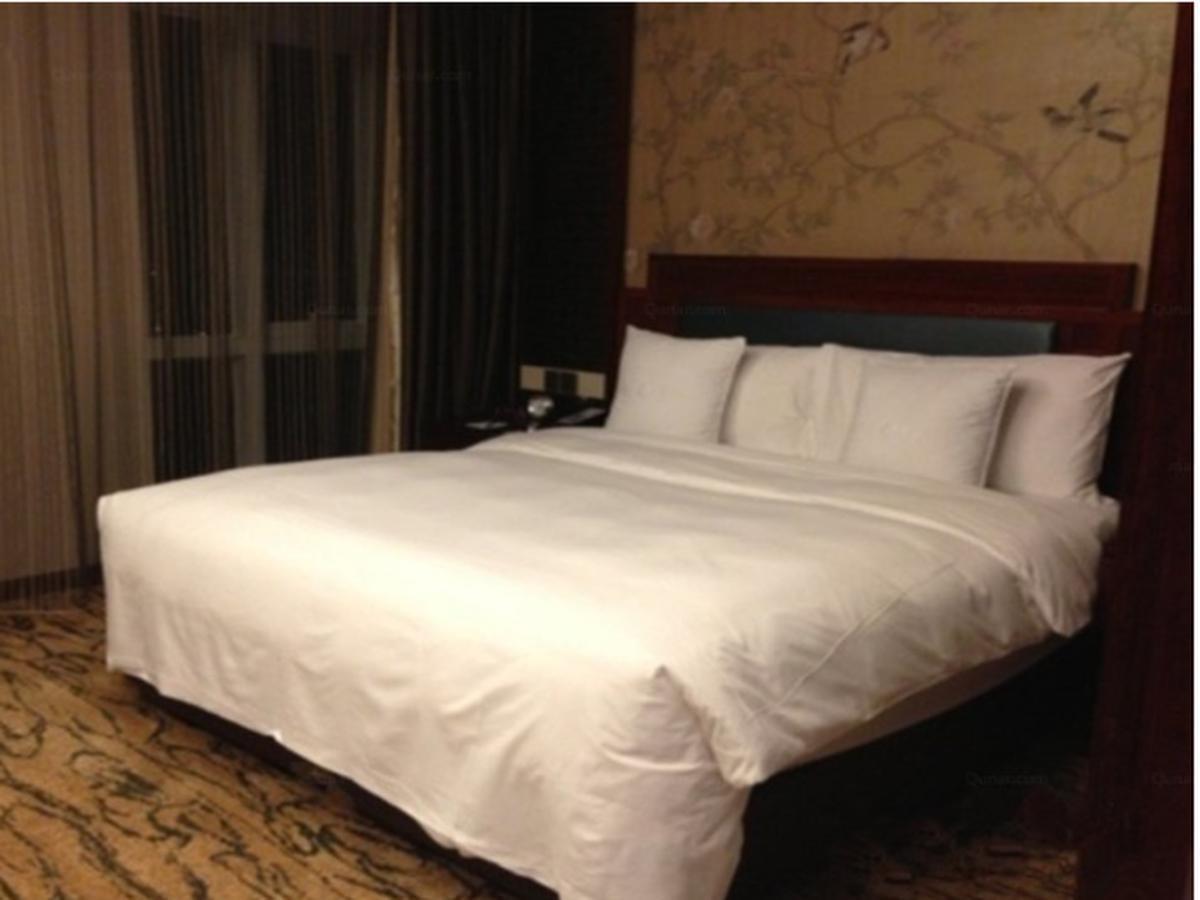 Gloria Grand Hotel Wuxi Wuxi  Bagian luar foto